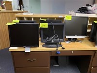 five Dell computer monitors