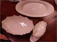 Four serving pieces of Lenox china,