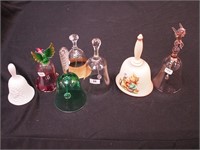 Seven decorative bells, mostly glass,