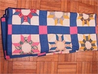 Vintage handsewn quilt in a star pattern,
