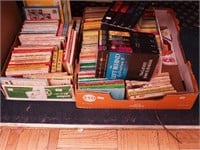 Two boxes of paperback cartoon books including
