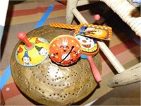 Noise makers, graniteware bucket, foot stool, rag