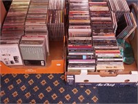 Two boxes of music CDs including The Beatles,