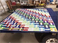 Machine sewn quilt, 89”x72”, hand tied