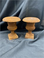 Two small cast-iron urns. 5 inches tall 4 inches