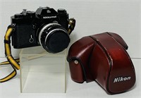 Nikkormat EL Camera, 50mm Lens, Red Leather Case