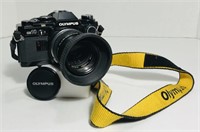 Olympus OM10. 35mm SLR. Black. Strap, uv filter,