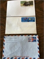 Two uncanceled postcards & air mail envelope