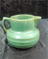 Pottery pitcher with unusual marking on bottom