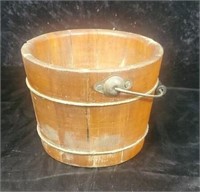 Wooden bucket with marking on bottom