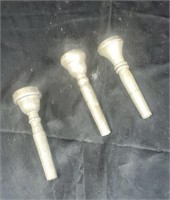 3 mouth pieces to a trumpet