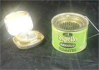 Expello vintage can and clock