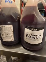 2 Jugs chain saw oil