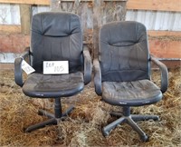 2 black office chairs