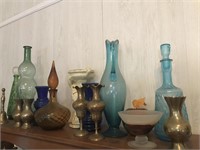 TOP SHELF CONTENTS BRASS, BOTTLES, ART GLASS