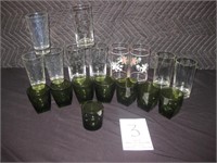 10 Water glasses, 7 green glasses, 1 shot glass