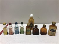 8 vintage Watkins bottles