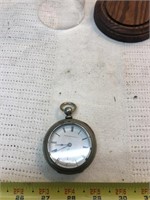 Elgin pocket watch with glass display