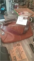 All weather leather Dooney & Bourke beautiful