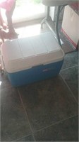 Blue and white Coleman cooler