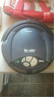 Roomba robotic floor vac with charging station