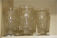 Eight glass footed tumblers