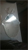 Small Shield style wall mirror