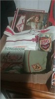 Flat of scouting items including a songbook