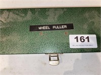 Wheel puller in metal box