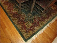 Green, Red, and Tan Floral Design Carpet