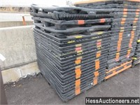 STACK OF PLASTIC PALLETS