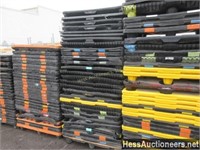 STACK OF PLASTIC PALLETS