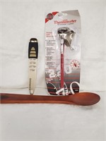 Kitchen lot spoons and thermometer