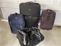 Suitcases and Titleist Duffle Bag