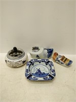 Delt blue ashtray; lighter, collectible