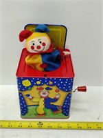 toy clown in a box musical, wind up