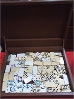 Dominoes in storage box