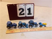 4 Toy Tractors