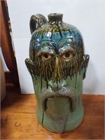 Face pottery jug 16" tall