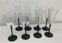 * (8) Black stemmed Wine glasses  (3) Different