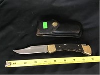 Case Buck 110x folding knife and sheath
