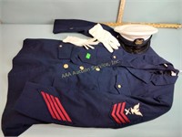 Military uniform with hat and gloves