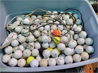 Tub of used golf balls