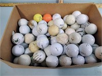 Box of used golf balls