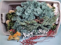 Christmas decor including wreaths and holly