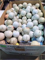Used golf balls in a box