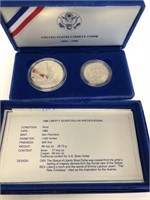 1986 US LIBERTY COINS--SILVER DOLLAR AND HALF DOL.