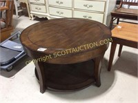 32” round dark wood coffee table