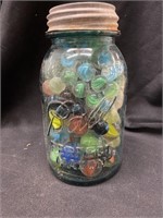 Antique blue Qt. Ball mason jar full of marbles