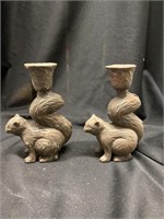 Two cast-iron squirrel candleholders. 6 inches